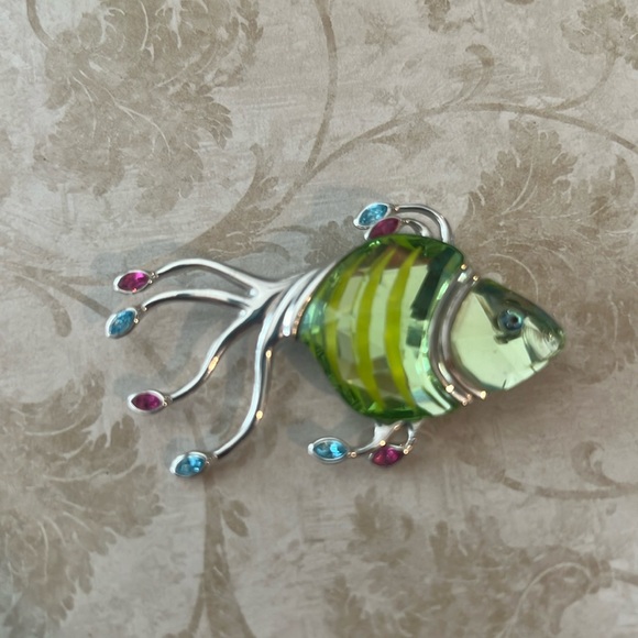 Swarovski Jewelry - Swarski fish pin. Has a little chip in it. See pictures.